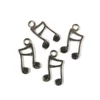 Charm metalni ukras, 4 komada - note, 3D