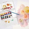 Winsor&Newton Cotman set vodenih boja, 24x1/2 drška + kist - Putovanje